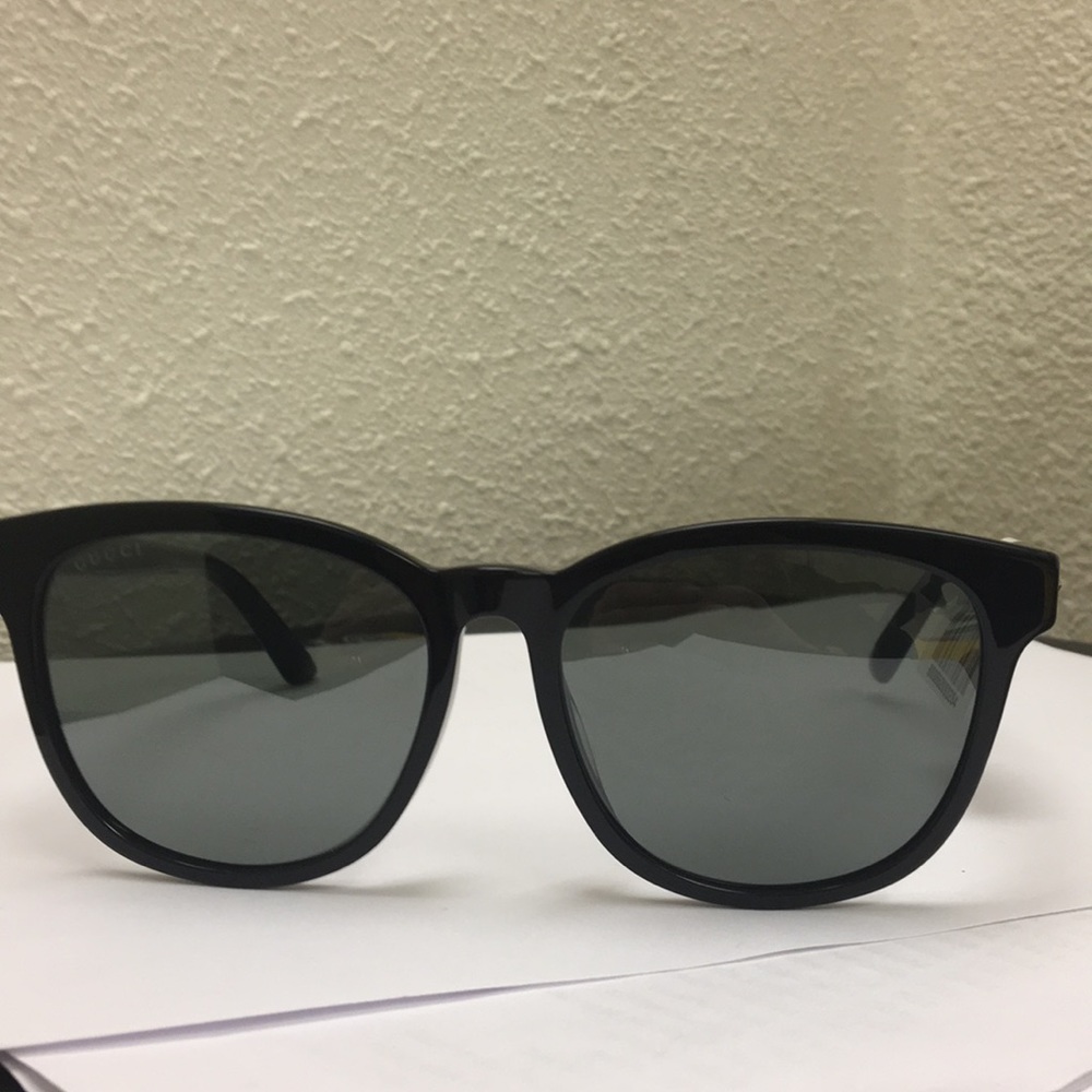 Gucci Black Frame Sunglasses with Dark Gray Lenses